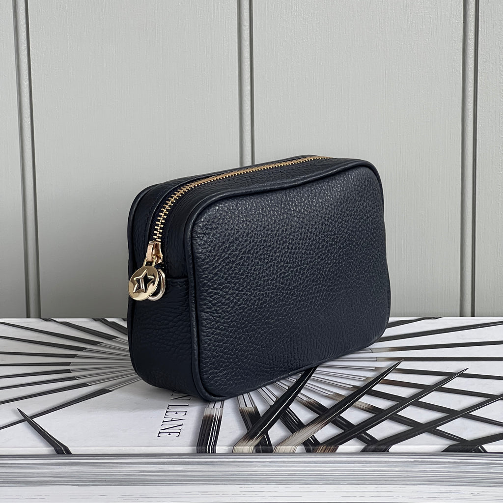 Navy Leather small handbag with gold star zip pull
