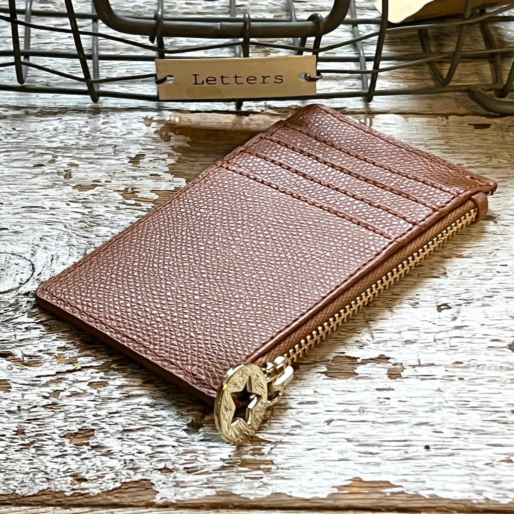 Saddle brown leather card holder with star disc