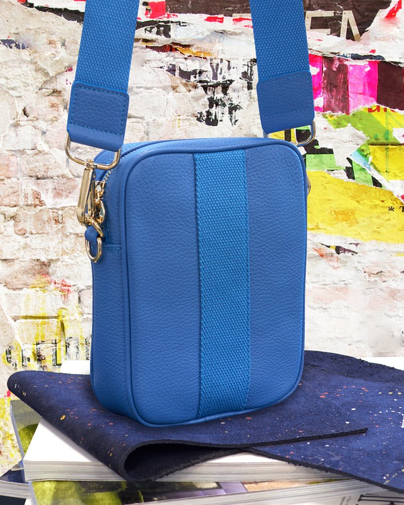 Blue leather camera crossbody bag