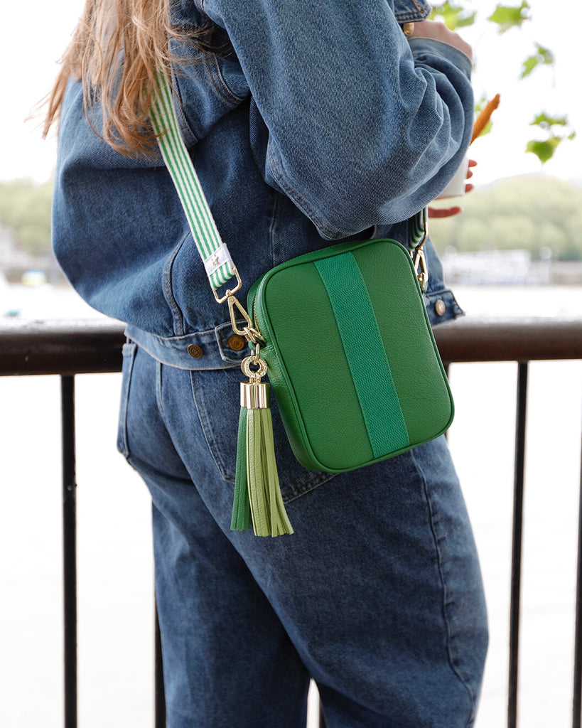 Green leather camera bag with interchangeable strap and tassel 