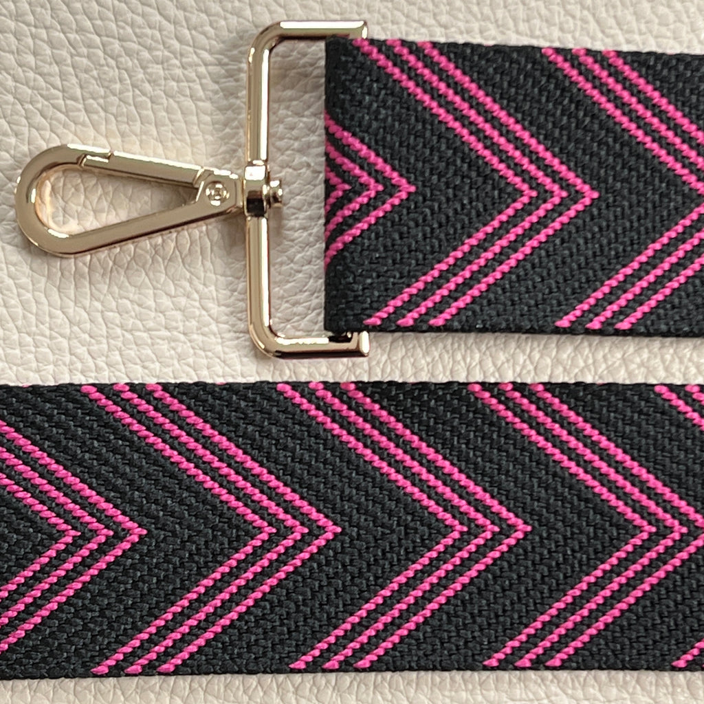 Interchangeable black and pink herringbone patterned wide bag strap with gold hardware 