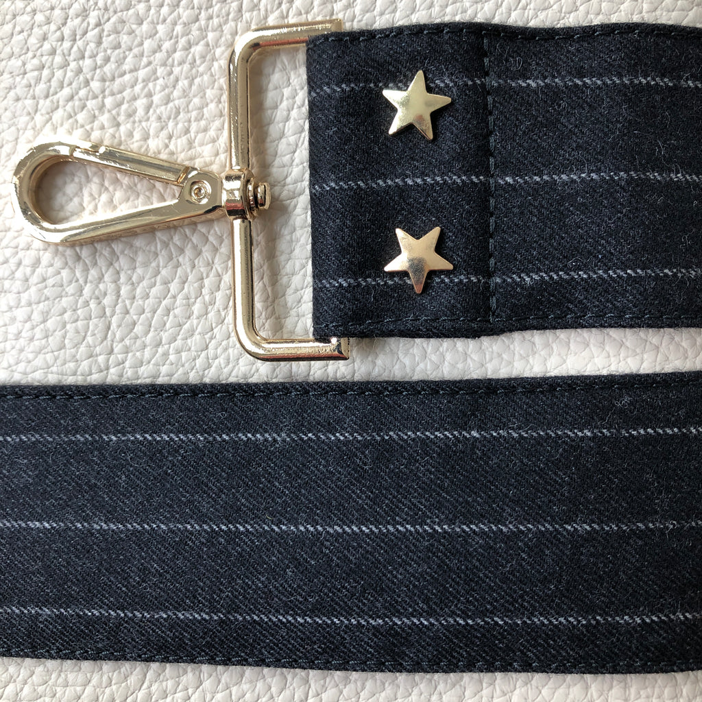 Interchangeable black pin stripe wide fabric bag strap with gold hardware 