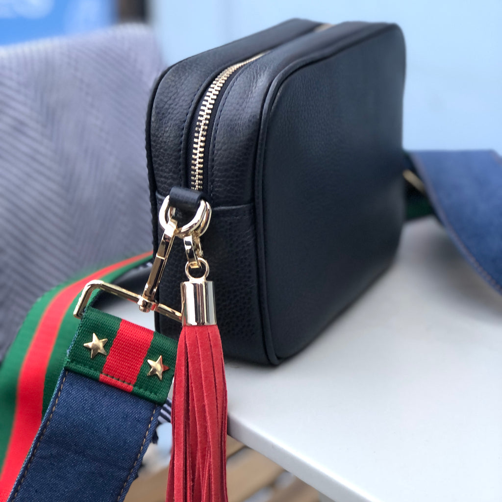 Interchangeable combo with navy blue camera bag and denim and  Reverse & cuff green & red stripe fabric bag strapwith red suede tassel all with gold hardware