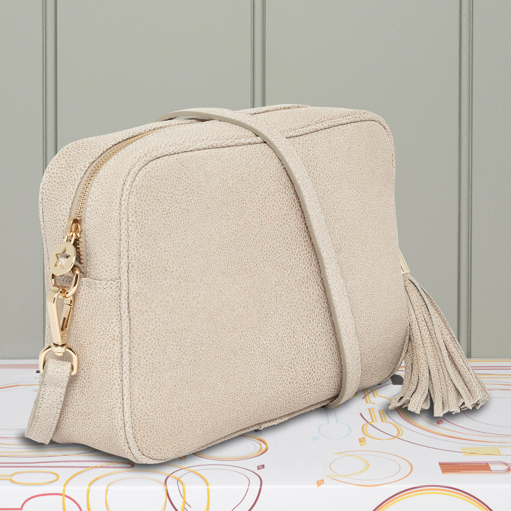 Large leather cream textured crossbody bag with removable matching tassel