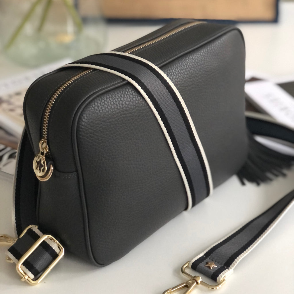 Large leather grey crossbody bag with grey with black white and grey striped slim interchangeable strap