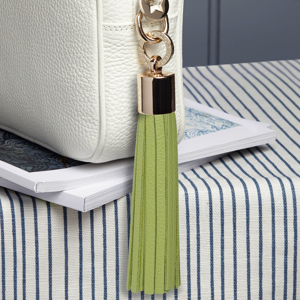 large leather lime green removable bag tassel with gold hardware and attachable charm ring 