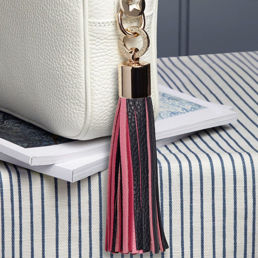 Large pink tones and navy removable bag tassel with gold hardware and attachable charm ring 
