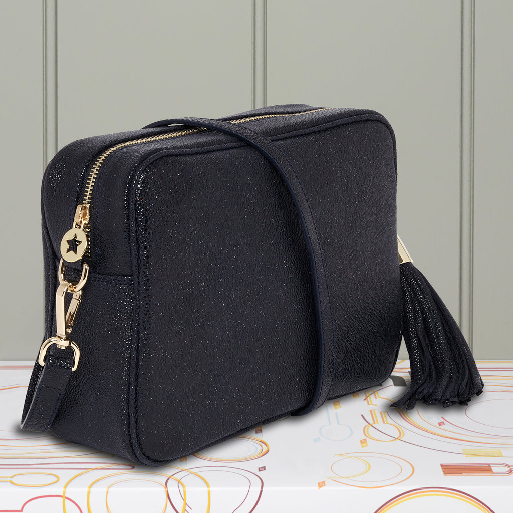 Large navy blue crossbody bag with removable matching large tassel