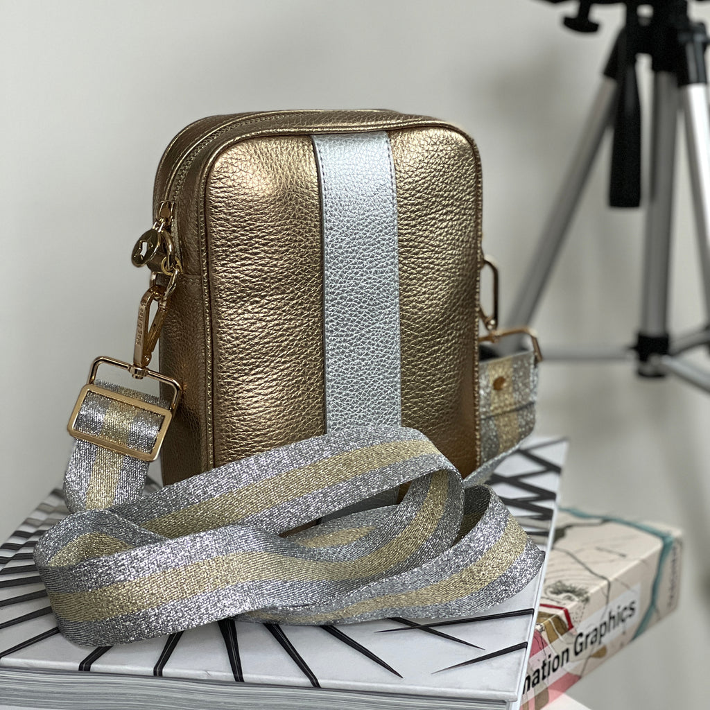 Large silver and gold cross body bag with interchangeable slim gold and silver striped strap with gold hardware 