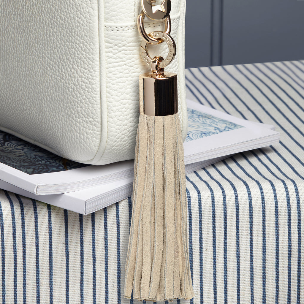 Large Leather removable bag tassel,  stone suede.  Light gold hardware plus light gold charm ring