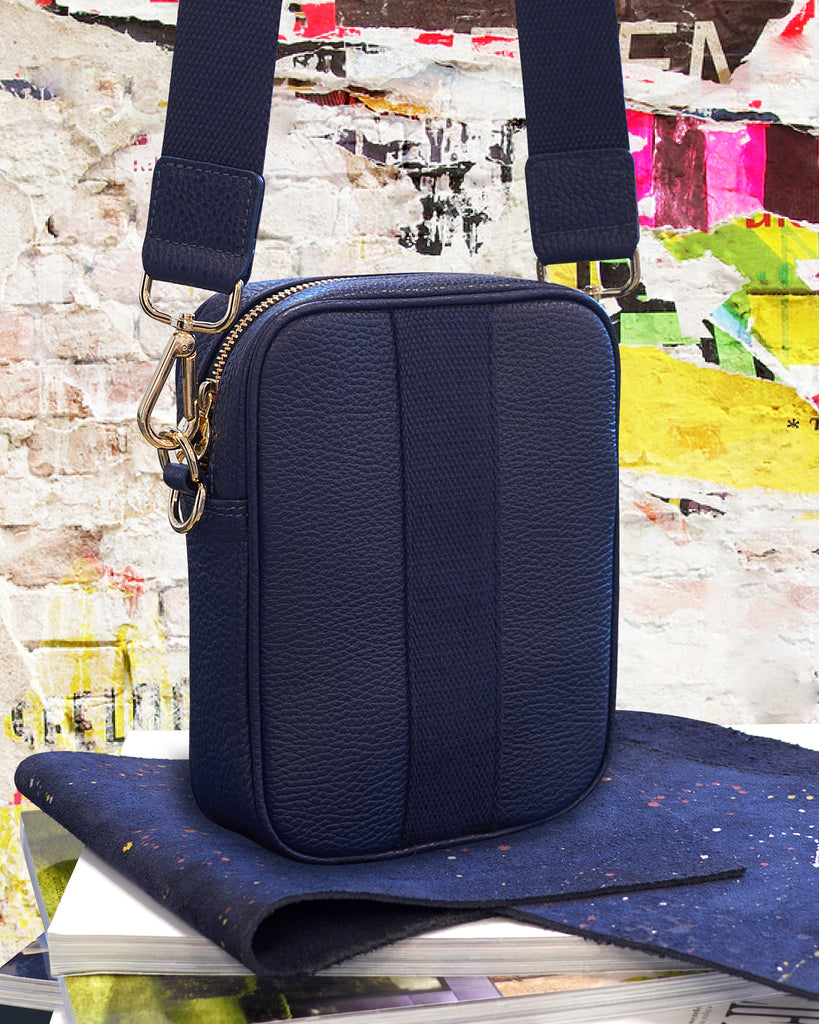 Navy camera crossbody bag with gold hardware