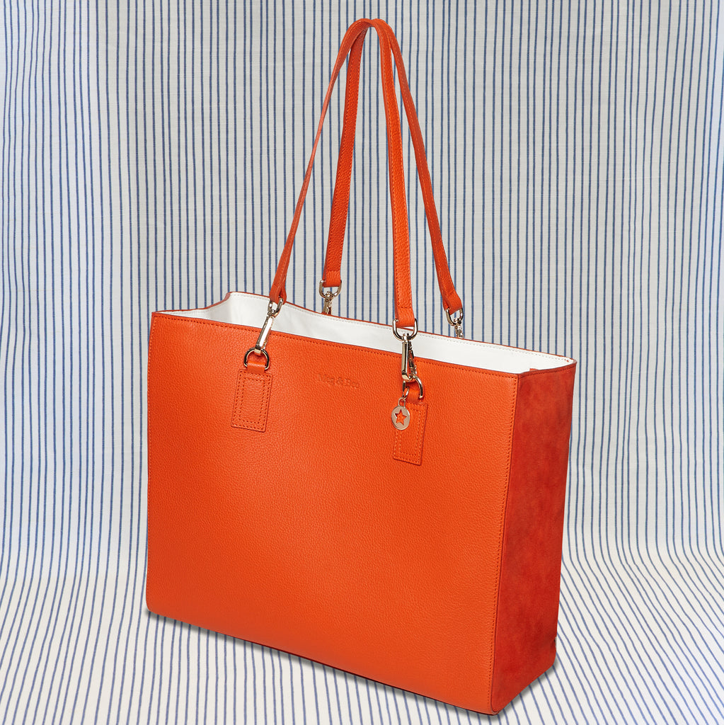 Orange slouchy leather tote bag