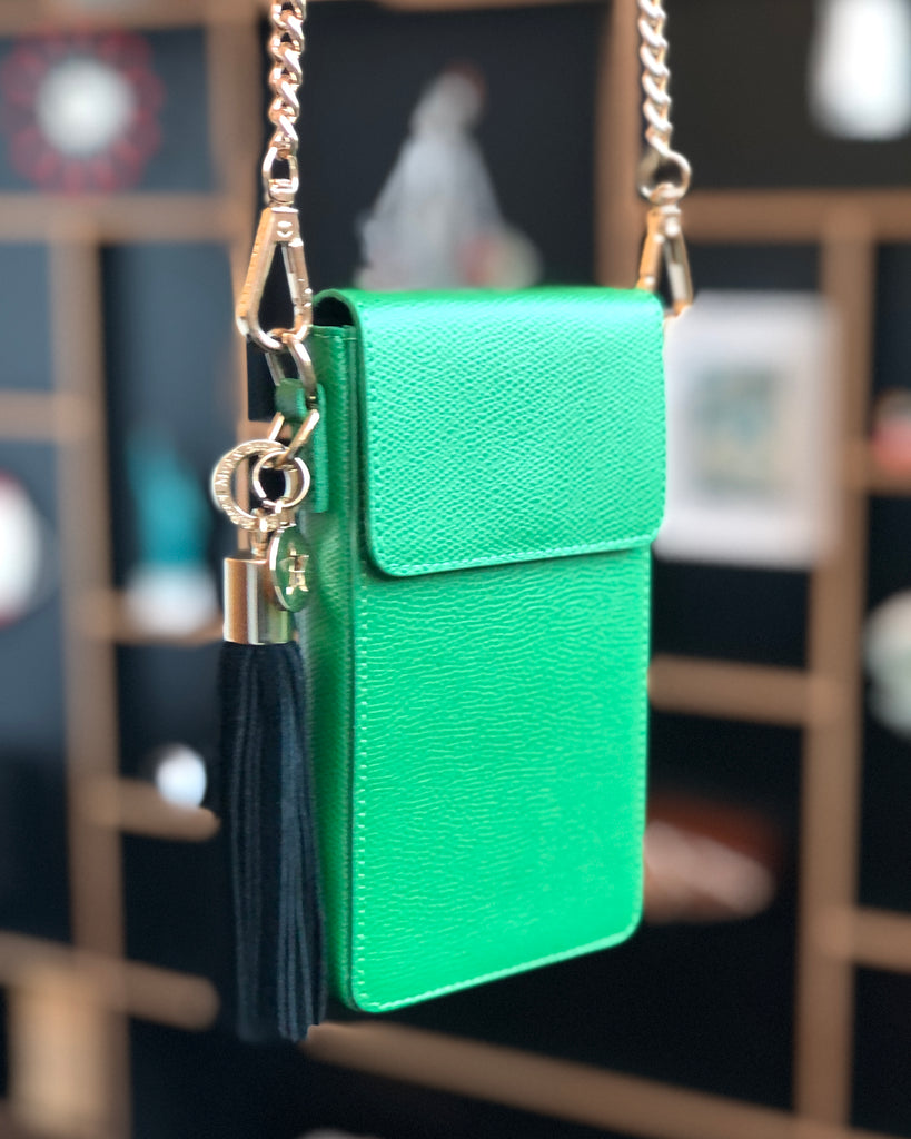 Small leather green phone bag with gold skinny chain strap and tassel 