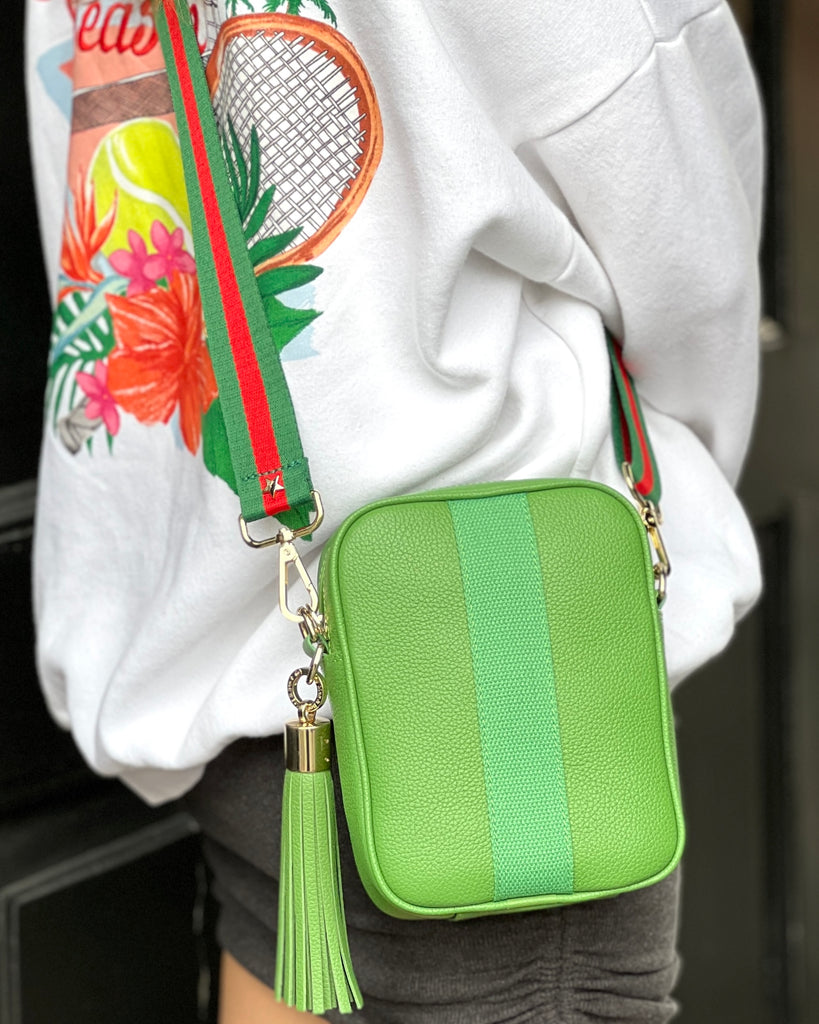 Green leather camera bag with interchangeable strap and tassel 