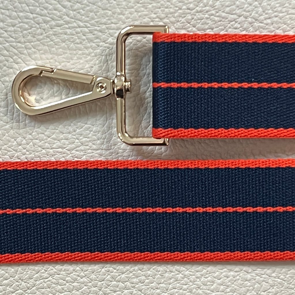 Interchangeable slim navy blue and orange striped fabric strap with gold hardware 