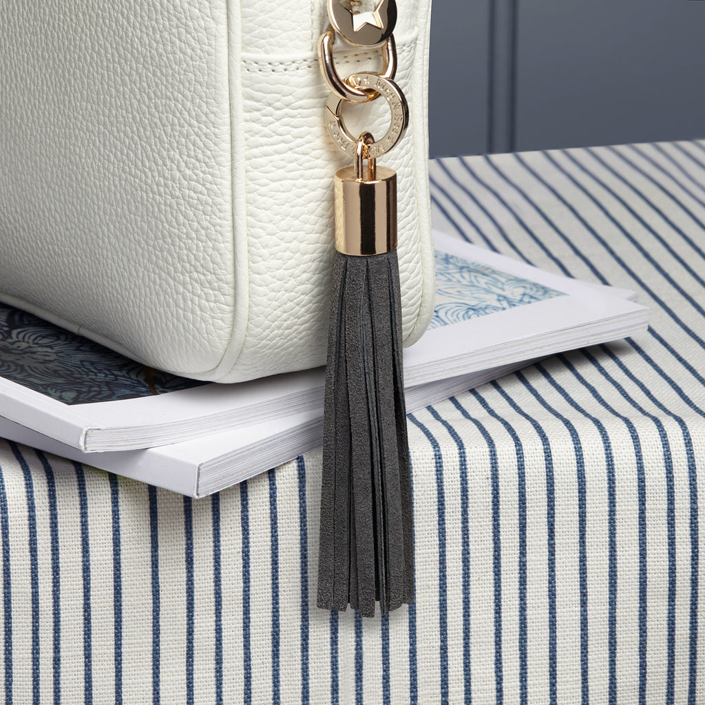 small suede slate grey removable bag tassel with hold hardware and charm ring 